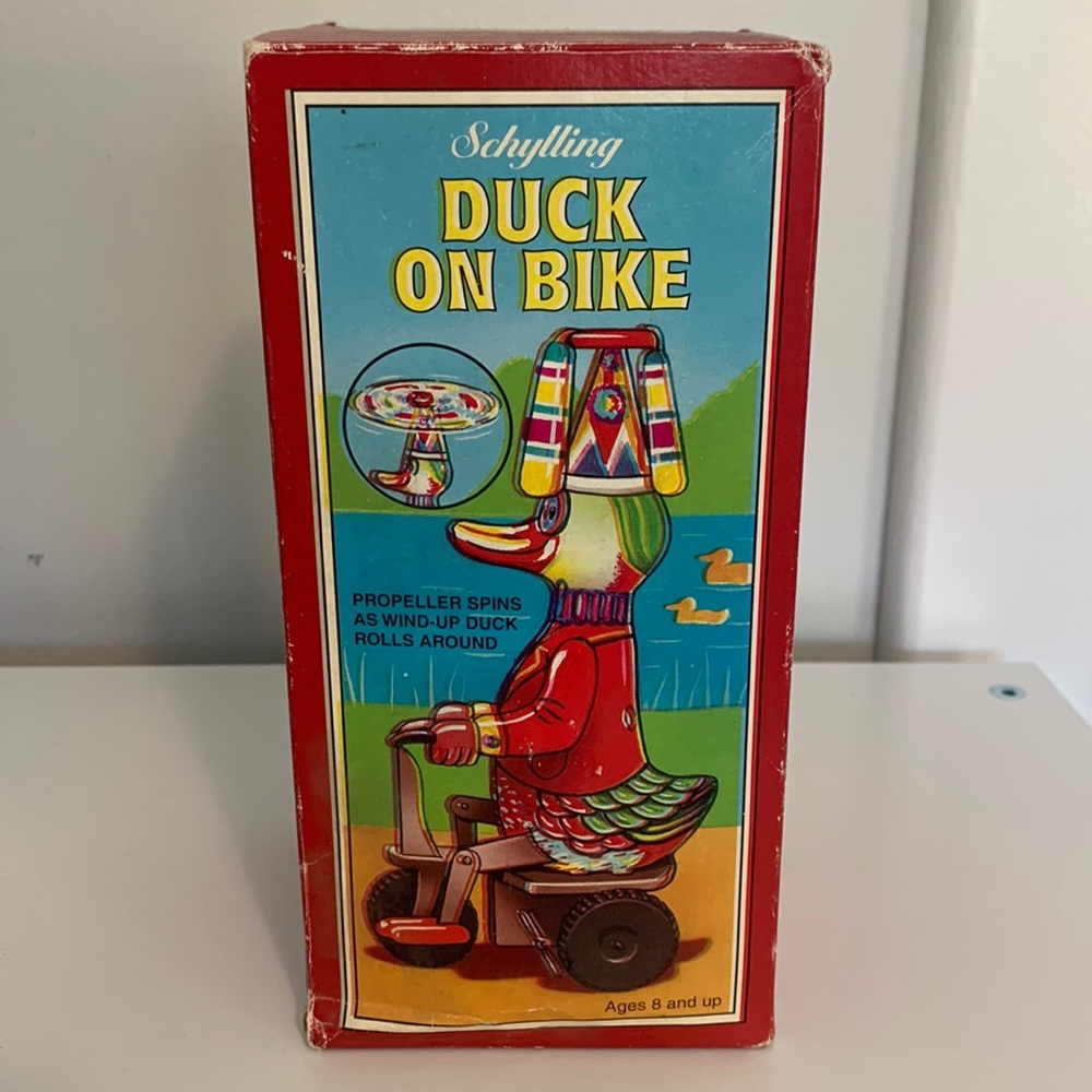 Vintage Schylling Duck on Bike collectors series